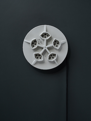 Alternative design of a porcelain multi-socket.