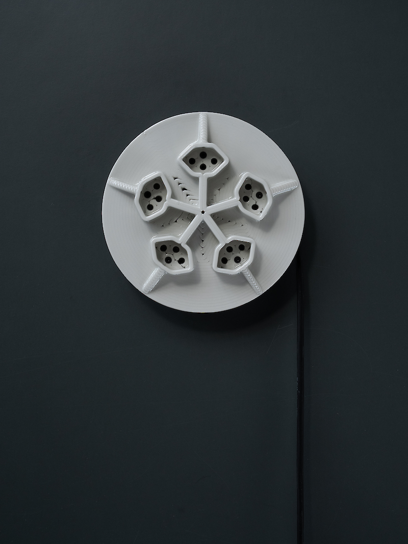 Alternative design of a porcelain multi-socket.